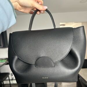 Polene black shoulder and cross body bag. Basically brand new, never used.